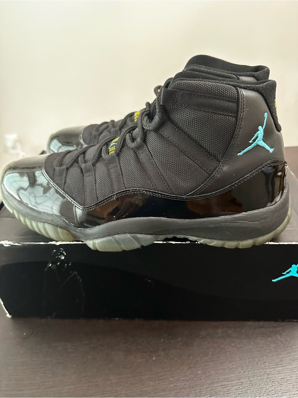 Jordan Retro 11 Black with Teal Jumpman